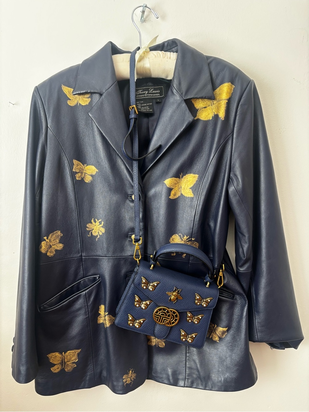 Louis Feraud purse and Blue Leather Blazer with Gold Butterfly Accents